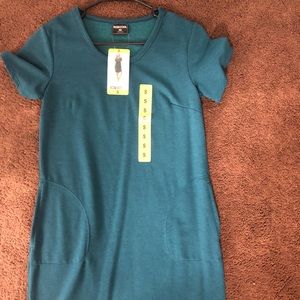 Teal colored tshirt dress with pockets.